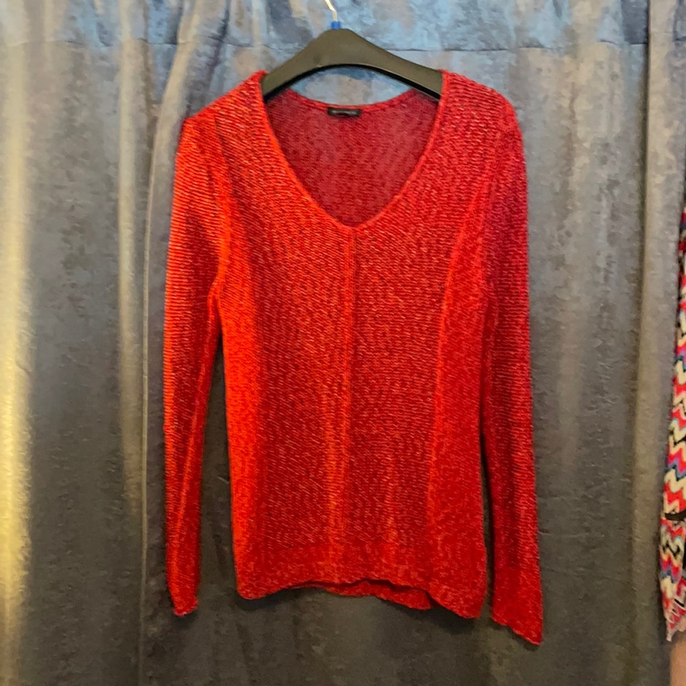 A red top, medium. This top always gets comments